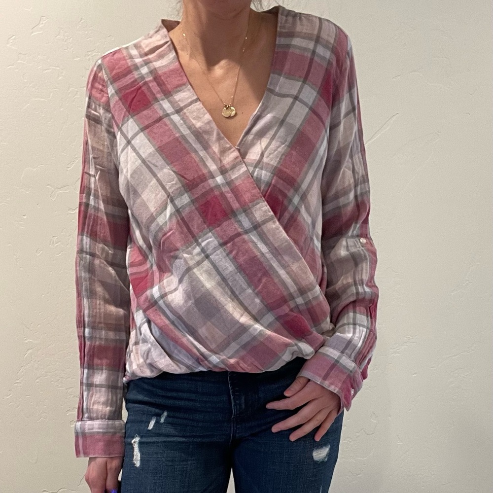 Express small pink plaid wrap top.